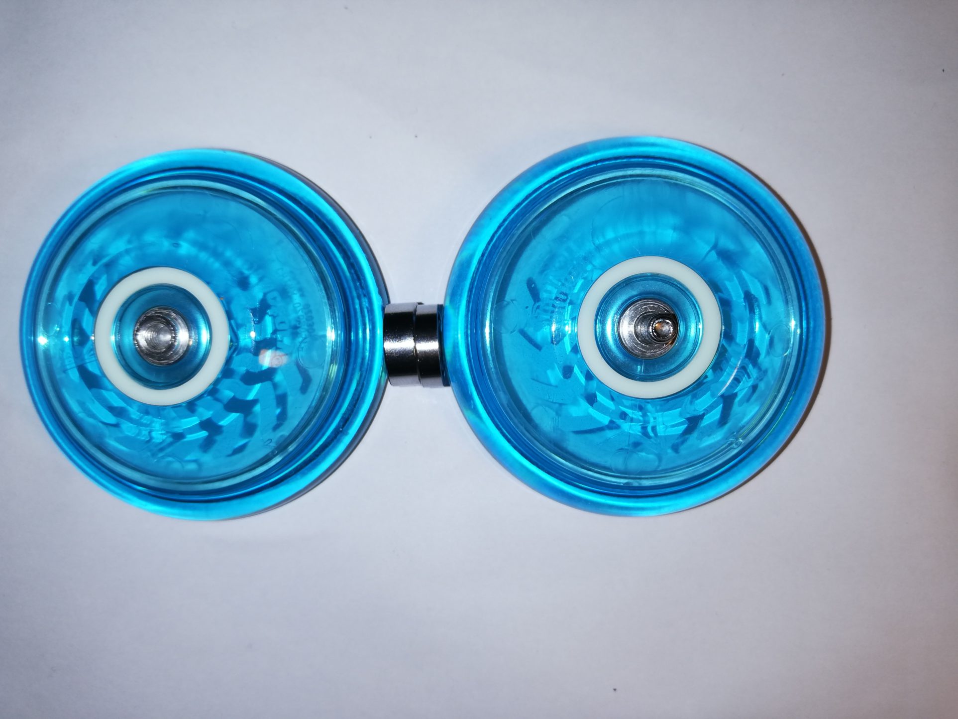 Two halves and the bearings of the Arrow yoyo